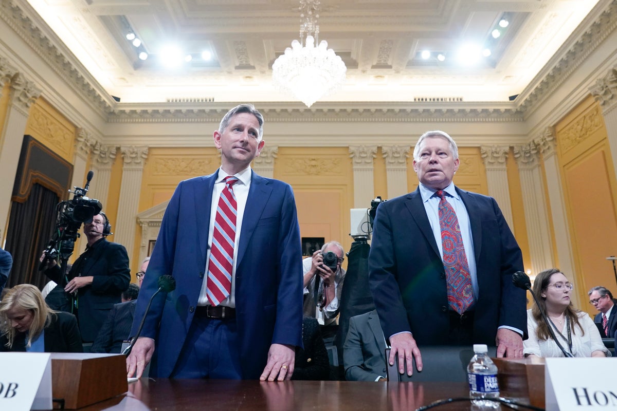 Greg Jacob, who was counsel to former Vice President Mike Pence, left, and Michael Luttig, a retired federal judge, arrive before the House select committee investigating the Jan. 6, 2021, attack on the Capitol holds a hearing at the Capitol in Washington, Thursday, June 16, 2022.(AP Photo/Susan Walsh)