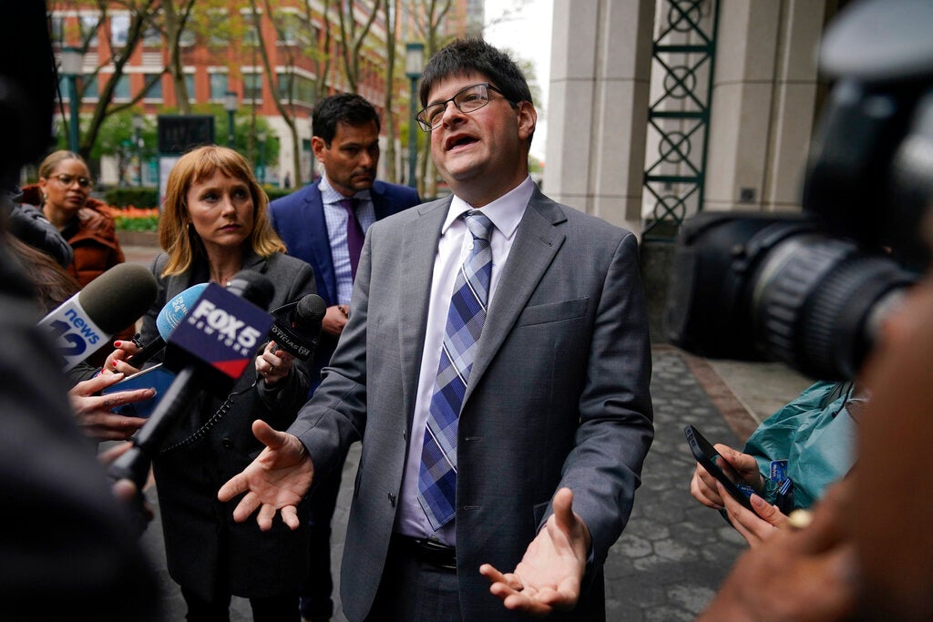 Eric Milner, an attorney representing the Amazon Labor Union, speaks with reporters outside an office of the National Labor Relations Board in New York, Monday, May 2, 2022. (AP Photo/Seth Wenig)