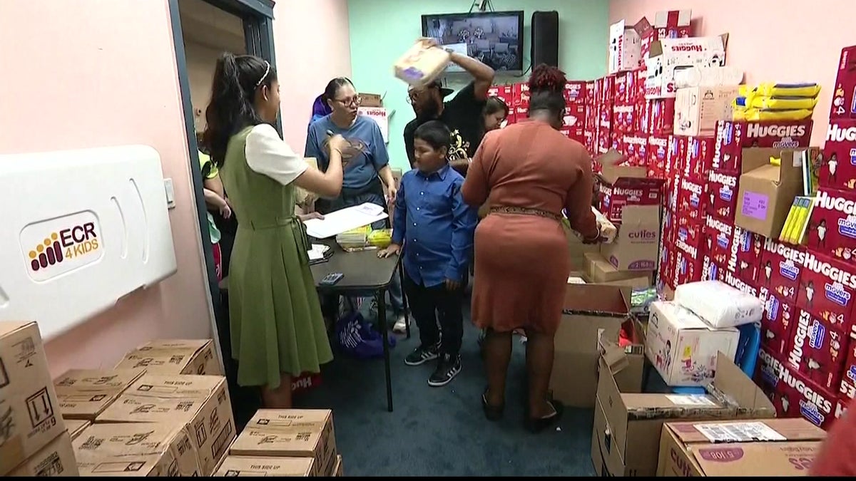 Parents on a tight budget pick up free diapers in Hempstead