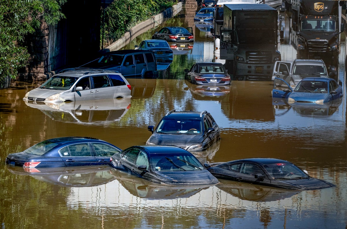 Cars and trucks are stranded by high water on the Major Deegan Expressway on Thursday Sept. 2, 2021. (AP Photo/Craig Ruttle, File)