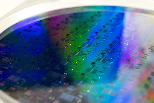 A 300-millimeter silicon wafer in the clean rooms at the Globalfoundries semiconductor fabrication (fab) plant in Dresden, Germany, on Thursday, Feb. 11, 2021. Photographer: Liesa Johannssen-Koppitz/Bloomberg via Getty Images