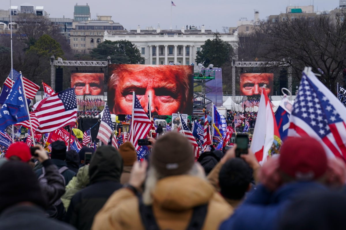 In this Jan. 6, 2021 photo, Donald Trump supporters participate in a rally in Washington, near the White House. (AP Photo/John Minchillo, File)