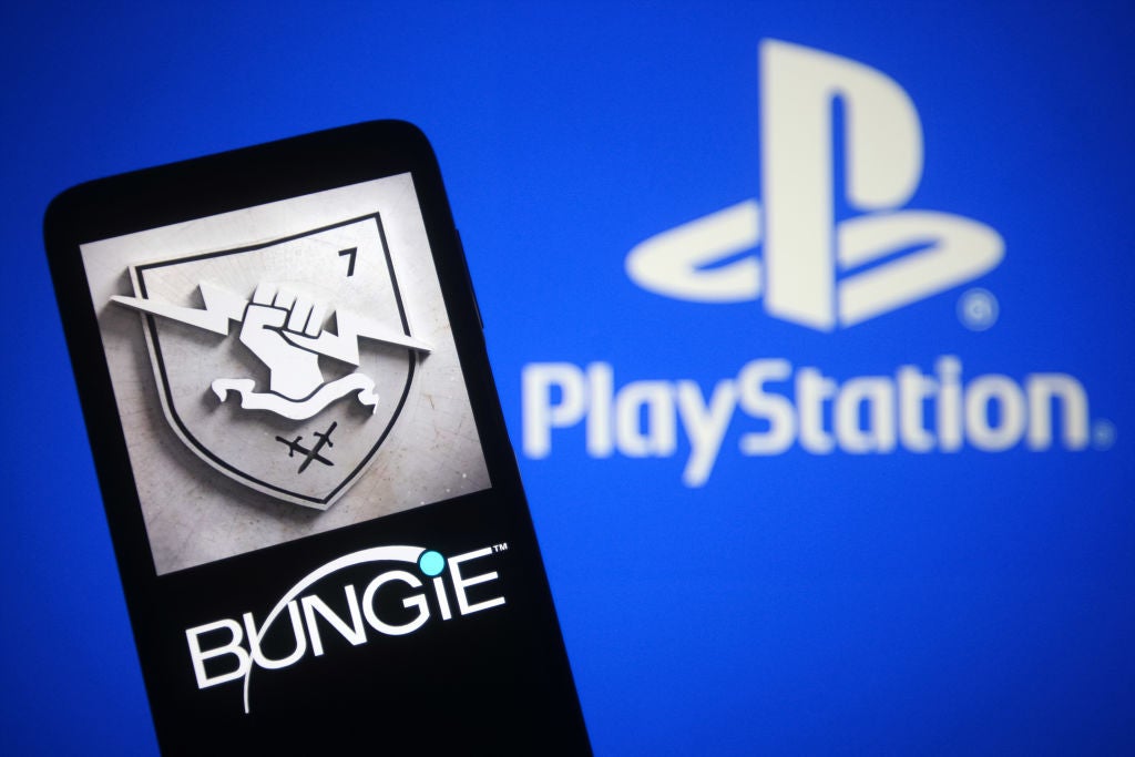In this photo illustration, a Bungie Inc. logo of a video game developer is seen on a smartphone screen and PlayStation (PS) logo in the background. (Photo Illustration by Pavlo Gonchar/SOPA Images/LightRocket via Getty Images)