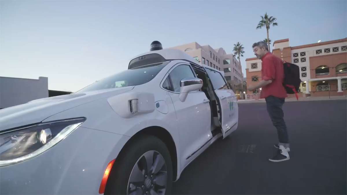 A Look at a Self-Driving Waymo Car from the Backseat
