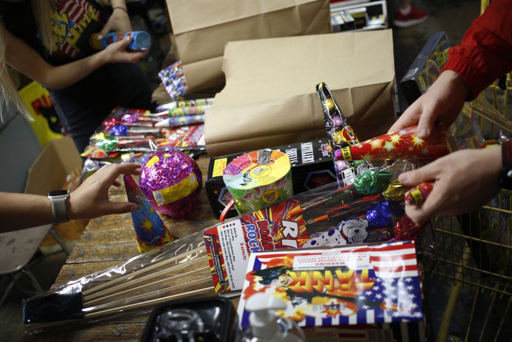 Employees ring up customer purchases at the Hee Haw Fireworks store in Goodlettsville, Tennessee, U.S., on Wednesday, June 30, 2020. With widespread cancellations of community Independence Day celebrations nationwide due to social distancing mandates related to Covid-19, backyard fireworks use is expected to hit an all-time high this year. Photographer: Luke Sharrett/Bloomberg via Getty Images