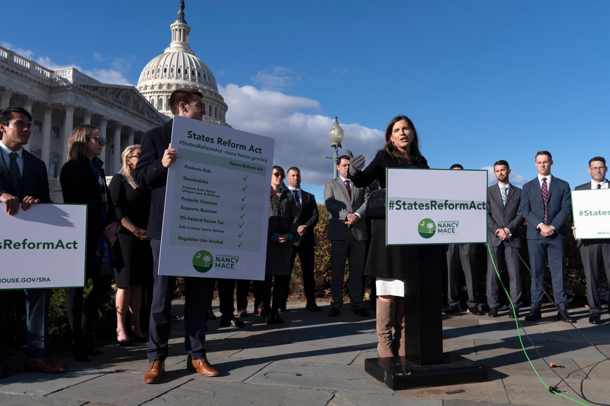 Rep. Nancy Mace, R-S.C., center, speaks during a news conference about a cannabis reform bill she introduced, Monday, Nov. 15, 2021, on Capitol Hill in Washington. (AP Photo/Jacquelyn Martin)