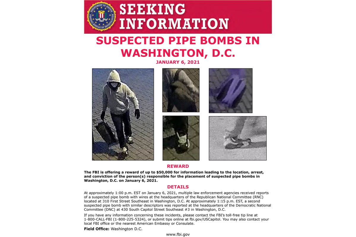 This image from an FBI poster seeking a suspect who allegedly placed pipe bombs in Washington on Jan. 6, 2021. Just before the U.S. Capitol was stormed by a sea of pro-Trump rioters the pipe bombs discovered. It quickly became one of the highest-priority investigations for the FBI and the Justice Department. Now, a year later, federal investigators are no closer to learning the person’s identity. And a key question remains: was there a connection between the pipe bombs and the riot at the Capitol? (FBI via AP)